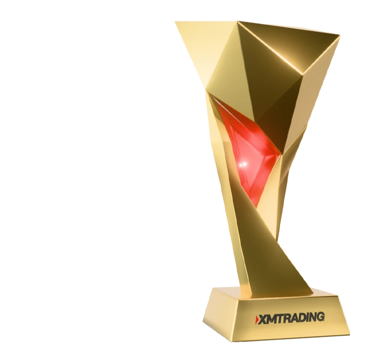Golden geometric VIP Affiliates trophy with a red inner accent, displayed on a base with the XMTrading logo.