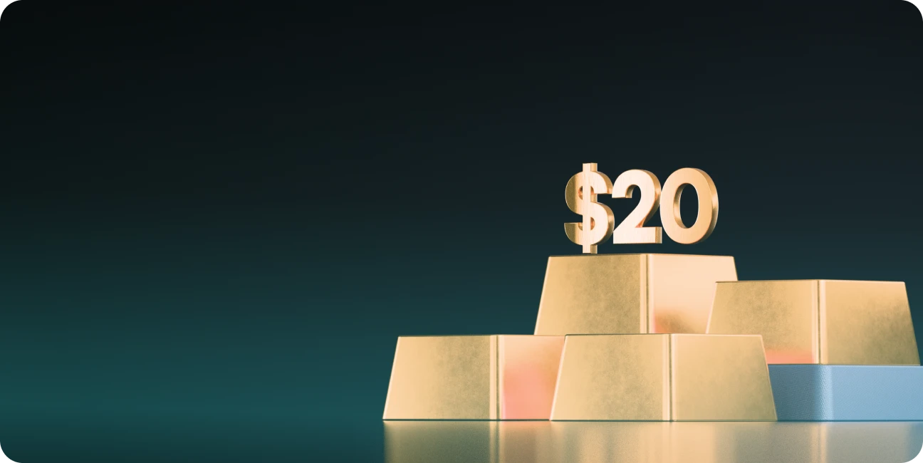 XMTrading unlimited commissions showing $20 payouts symbolised by gold bars and large $20 figure