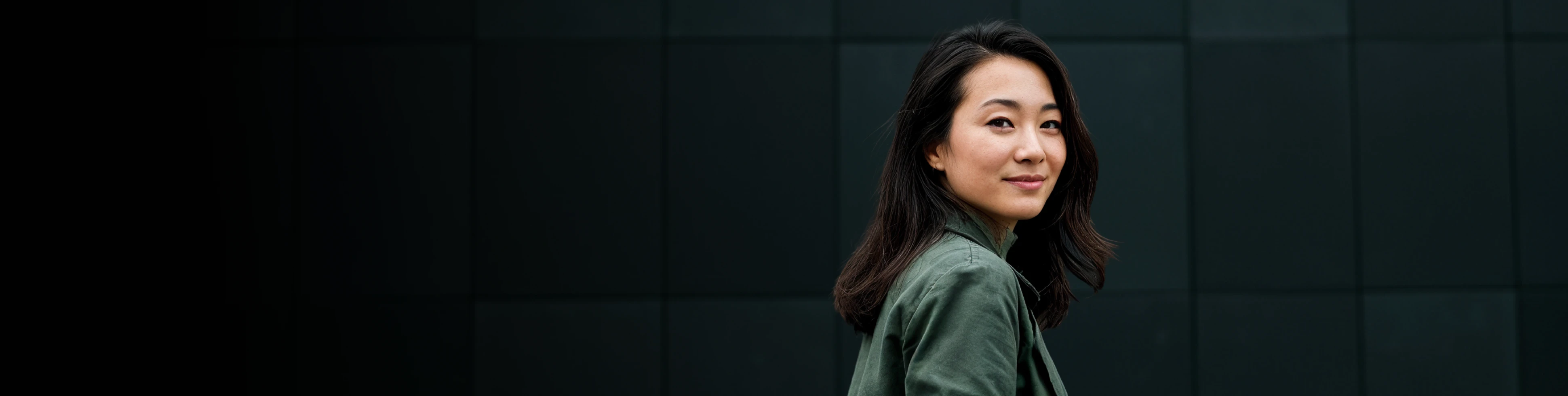 Confident woman smiling confidently.