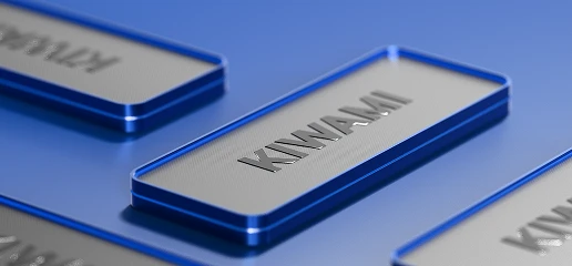 Close-up of the KIWAMI account card in a sleek metallic 3D design with distinctive blue accents.