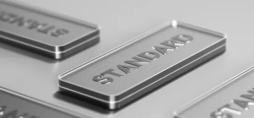 Close-up of floating account type cards with the Standard account highlighted in a sleek metallic 3D design.